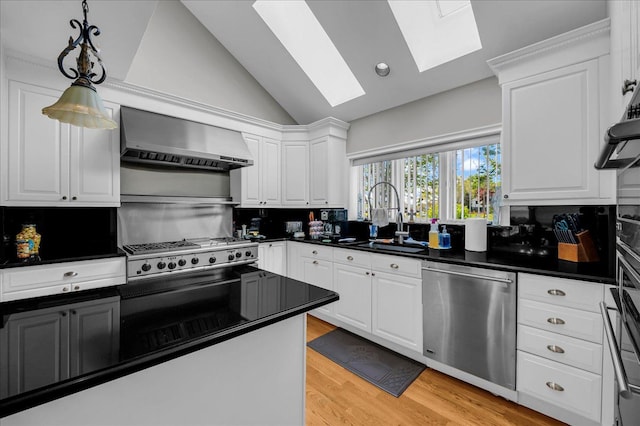 32630 Jefferson Ave, Saint Clair Shores, MI 48082 - kitchen featuring stainless steel dishwasher, wall chimney exhaust hood, a sink, a skylight, and vaulted ceiling