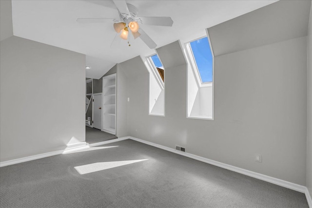 32630 Jefferson Ave, Saint Clair Shores, MI 48082 - additional living space with ceiling fan, carpet floors, baseboards, and vaulted ceiling