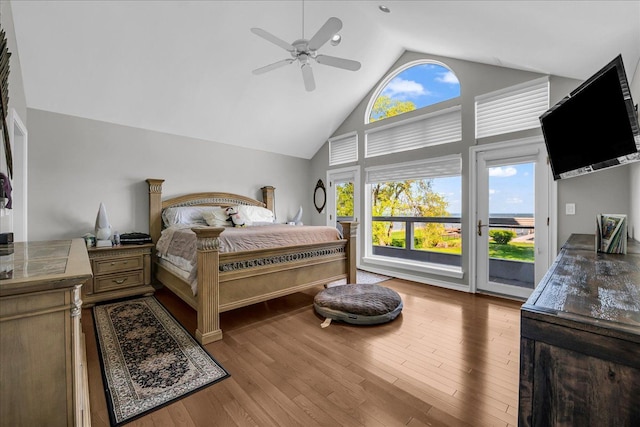 32630 Jefferson Ave, Saint Clair Shores, MI 48082 - bedroom featuring access to exterior, high vaulted ceiling, a ceiling fan, and wood finished floors