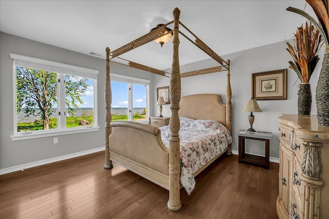 32630 Jefferson Ave, Saint Clair Shores, MI 48082 - bedroom with baseboards, dark wood-style floors, and a ceiling fan