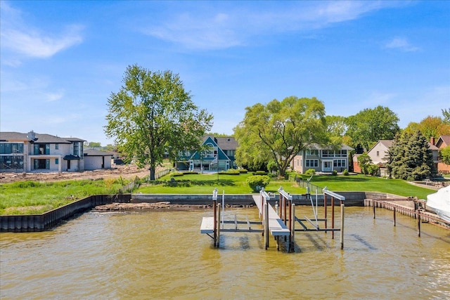 32630 Jefferson Ave, Saint Clair Shores, MI 48082 - dock with a water view, boat lift, a lawn, and a residential view