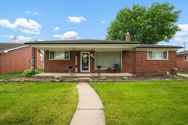 27607 Buckingham St, Livonia, MI 48154 - ranch-style home with covered porch, brick siding, a front yard, and a chimney