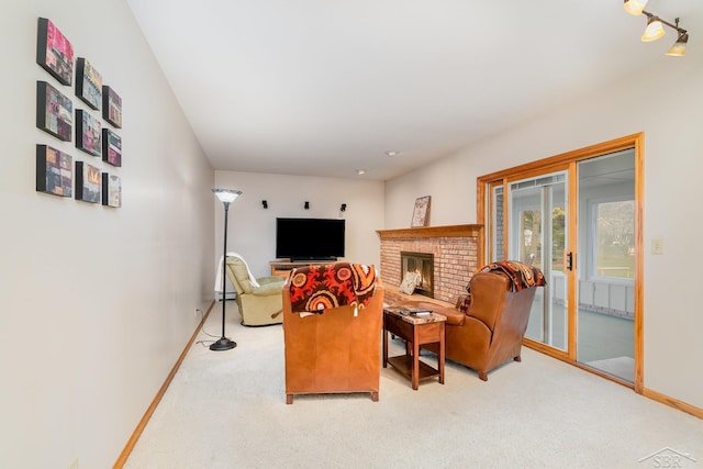 2303 Wilmington St, Midland, MI 48642 - carpeted living room featuring baseboards, a baseboard heating unit, and a fireplace