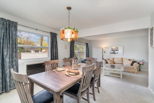 2303 Wilmington St, Midland, MI 48642 - dining room with light carpet and baseboards
