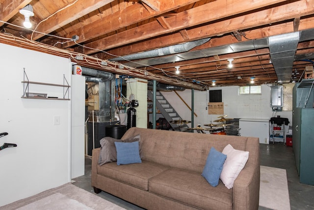 below grade area featuring electric panel and stairway