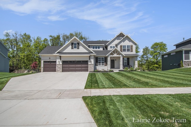 craftsman inspired home featuring concrete driveway, a garage, a front lawn, and stone siding