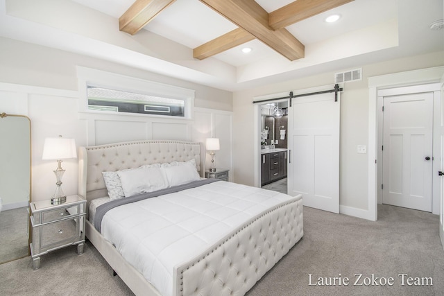 bedroom featuring light colored carpet, a barn door, beam ceiling, coffered ceiling, and recessed lighting