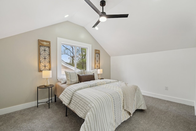 carpeted bedroom featuring lofted ceiling, baseboards, and ceiling fan