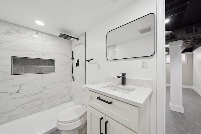 bathroom with a marble finish shower, vanity, toilet, and baseboards