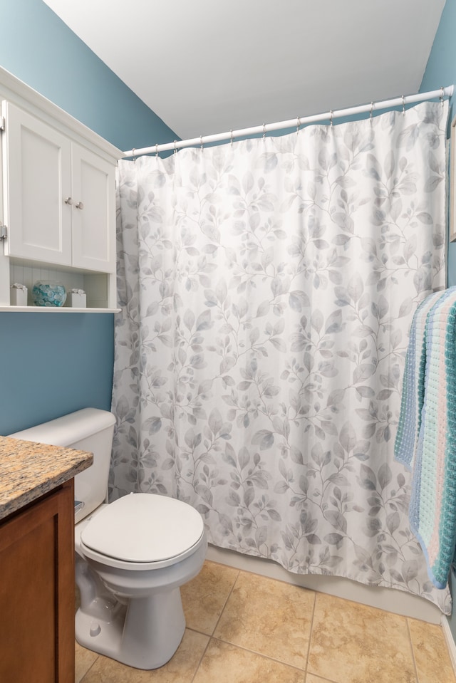 244 Wright St Unit 77, Wixom, MI 48393 - bathroom with toilet, tile patterned floors, vanity, and a shower with curtain