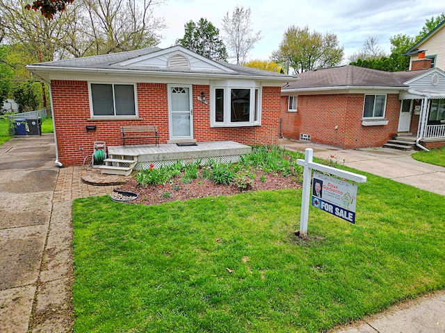 9963 Arnold, Redford, MI 48239 - view of front of home with brick siding and a front yard