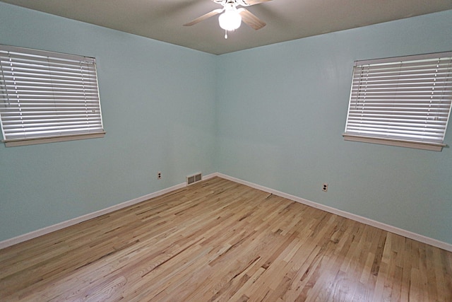 9963 Arnold, Redford, MI 48239 - spare room with a ceiling fan, wood finished floors, and baseboards