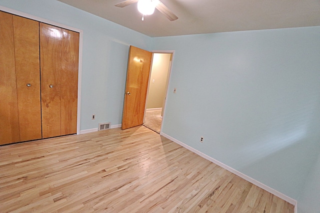 9963 Arnold, Redford, MI 48239 - unfurnished bedroom with light wood finished floors, baseboards, a closet, and ceiling fan
