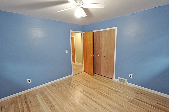 9963 Arnold, Redford, MI 48239 - unfurnished bedroom with baseboards, wood finished floors, a closet, and ceiling fan