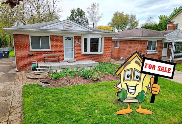 9963 Arnold, Redford, MI 48239 - view of front of property with brick siding, a front yard, and a wooden deck