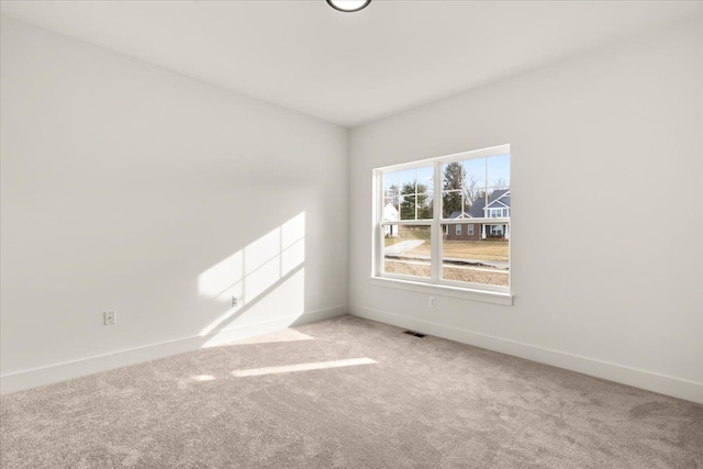 6514 Cambridge Cir, Clarkston, MI 48346 - carpeted spare room with baseboards