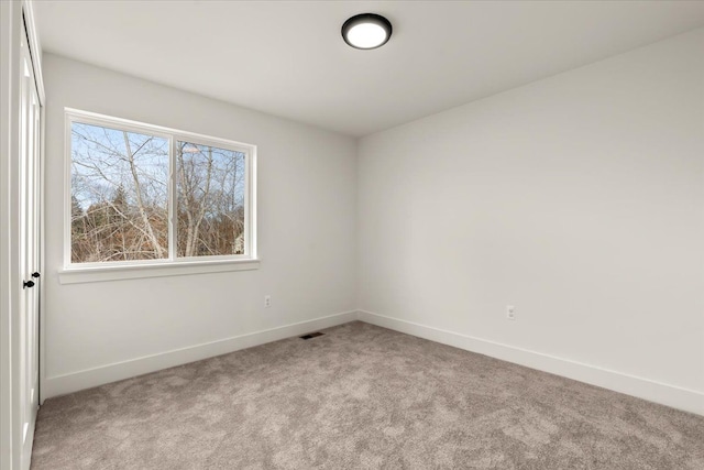 6514 Cambridge Cir, Clarkston, MI 48346 - carpeted empty room with baseboards
