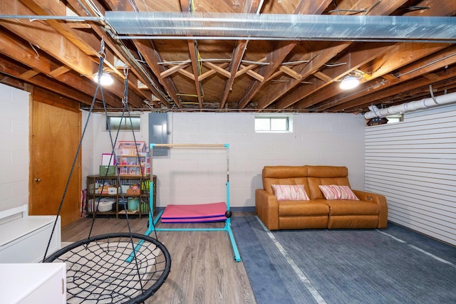 1066 Knight Rd, Ann Arbor, MI 48103 - basement featuring wood finished floors and electric panel