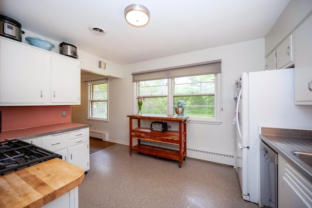 1066 Knight Rd, Ann Arbor, MI 48103 - kitchen with dishwasher, baseboard heating, and white cabinetry