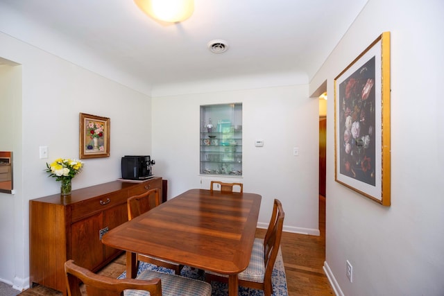1066 Knight Rd, Ann Arbor, MI 48103 - dining area featuring baseboards and wood finished floors