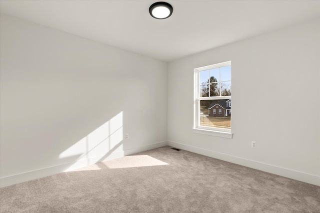 6515 Cambridge Cir, Clarkston, MI 48346 - unfurnished room with light colored carpet and baseboards