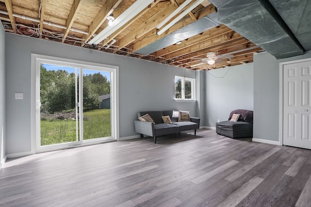 19101 Weller Rd, Gregory, MI 48137 - sitting room featuring healthy amount of natural light, wood finished floors, and baseboards