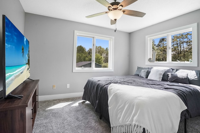 19101 Weller Rd, Gregory, MI 48137 - bedroom with baseboards, carpet flooring, and ceiling fan