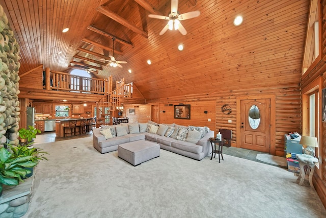 3380 Norvell Rd, Grass Lake, MI 49240 - living area with high vaulted ceiling, a ceiling fan, light colored carpet, rustic walls, and wooden ceiling