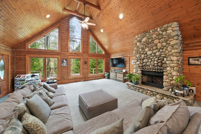 3380 Norvell Rd, Grass Lake, MI 49240 - carpeted living area with high vaulted ceiling, log walls, wood ceiling, a stone fireplace, and a ceiling fan
