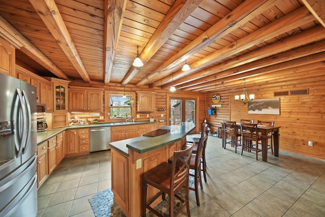 3380 Norvell Rd, Grass Lake, MI 49240 - kitchen featuring stainless steel appliances, wooden ceiling, a sink, dark countertops, and light tile patterned flooring