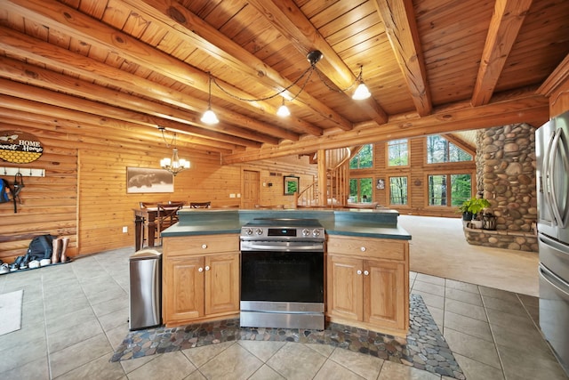 3380 Norvell Rd, Grass Lake, MI 49240 - kitchen with appliances with stainless steel finishes, dark countertops, open floor plan, tile patterned flooring, and wooden ceiling