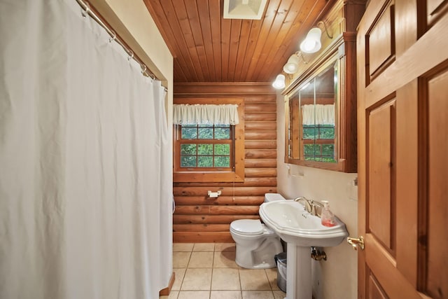 3380 Norvell Rd, Grass Lake, MI 49240 - full bathroom with rustic walls, tile patterned floors, toilet, wood ceiling, and a shower with shower curtain