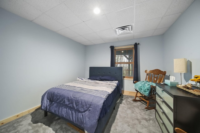 3380 Norvell Rd, Grass Lake, MI 49240 - bedroom featuring carpet, a paneled ceiling, and baseboards