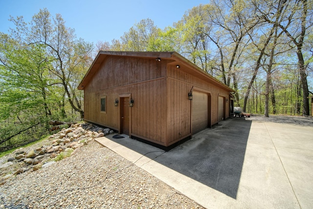3380 Norvell Rd, Grass Lake, MI 49240 - view of property exterior featuring an outdoor structure and a garage