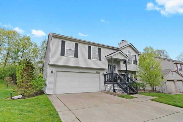 2694 Driftwood Dr, Waterford, MI 48329 - raised ranch featuring a chimney, a garage, driveway, and a front lawn