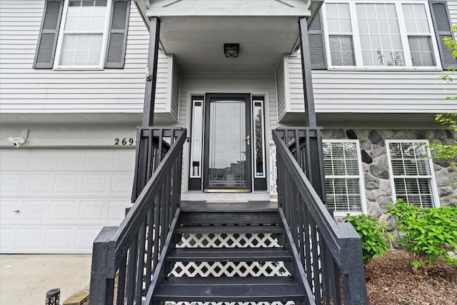 2694 Driftwood Dr, Waterford, MI 48329 - property entrance featuring stone siding