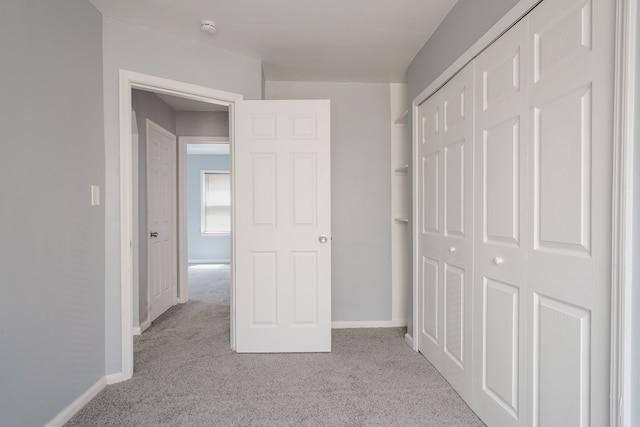 4226 Cadillac Ave, Wayne, MI 48184 - unfurnished bedroom featuring carpet flooring, a closet, and baseboards