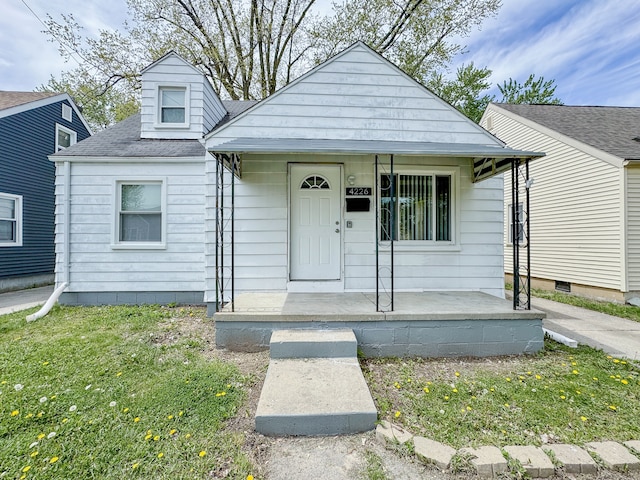 4226 Cadillac Ave, Wayne, MI 48184 - view of front of house featuring covered porch and a shingled roof