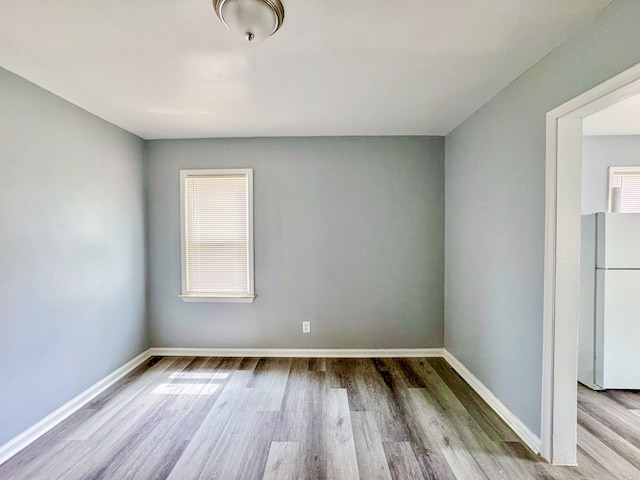 4226 Cadillac Ave, Wayne, MI 48184 - unfurnished room featuring wood finished floors and baseboards
