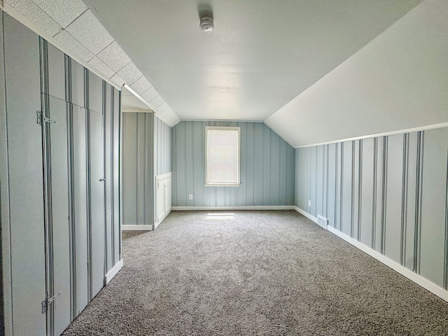 4226 Cadillac Ave, Wayne, MI 48184 - additional living space with carpet flooring, vaulted ceiling, and baseboards