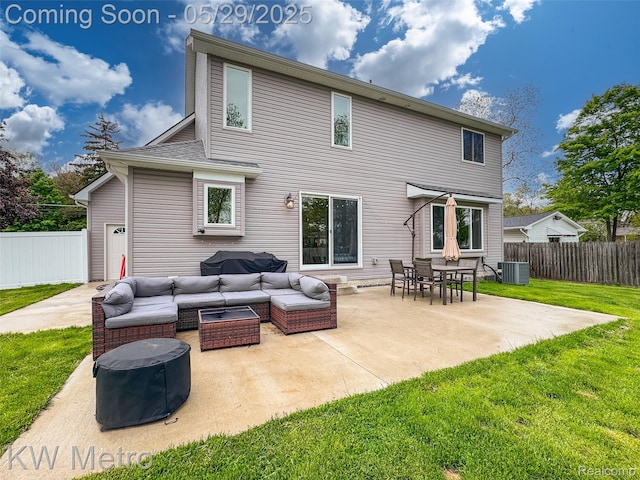 70276 N Main St, Richmond, MI 48062 - back of property with cooling unit, outdoor lounge area, and a patio