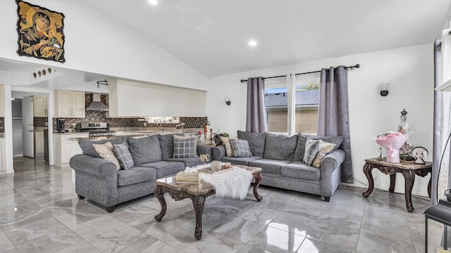 living area with light marble finish floors, recessed lighting, and high vaulted ceiling