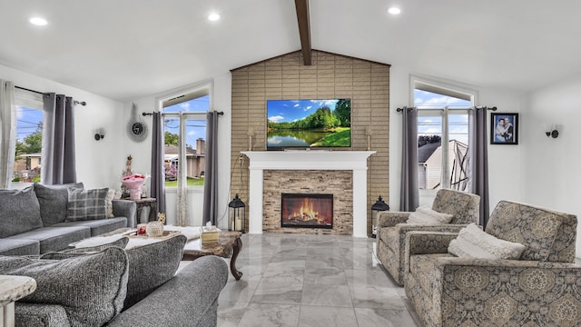 living room featuring light marble finish flooring, a large fireplace, recessed lighting, and plenty of natural light