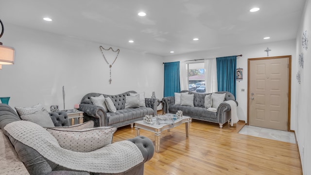 living room featuring recessed lighting and light wood finished floors