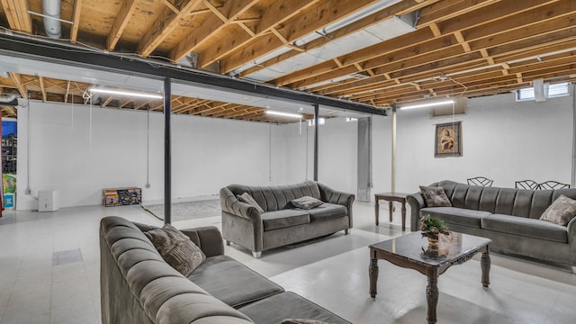 living area with tile patterned floors