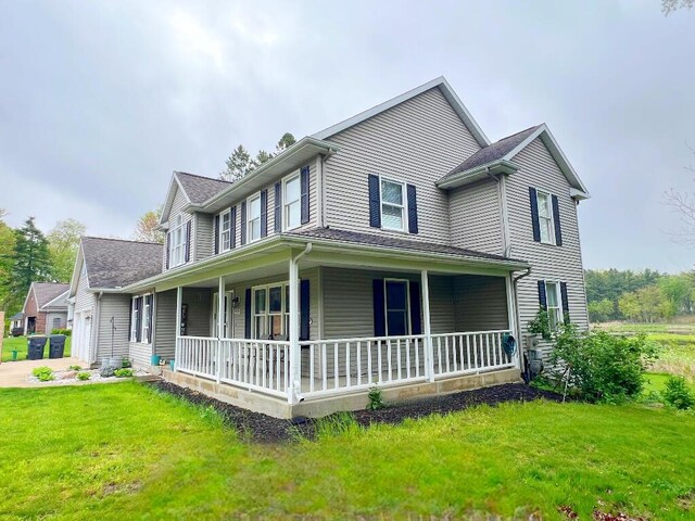 9220 Cotters Ridge Rd, Richland, MI 49083 - view of front of home with covered porch and a front lawn
