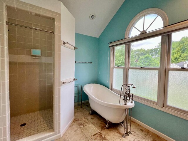9220 Cotters Ridge Rd, Richland, MI 49083 - full bathroom featuring tiled shower, a soaking tub, plenty of natural light, vaulted ceiling, and baseboards