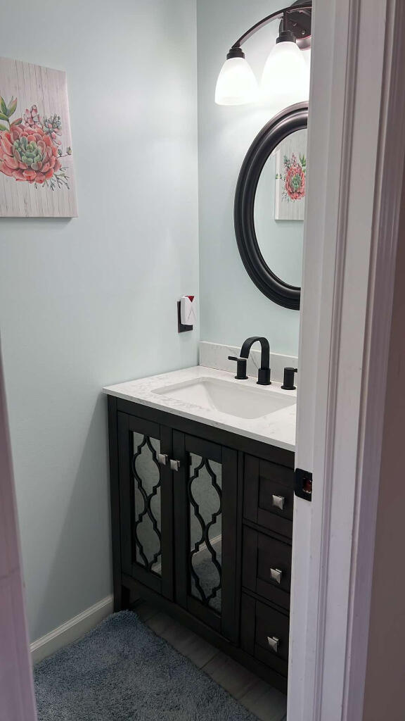 9220 Cotters Ridge Rd, Richland, MI 49083 - bathroom featuring vanity and baseboards