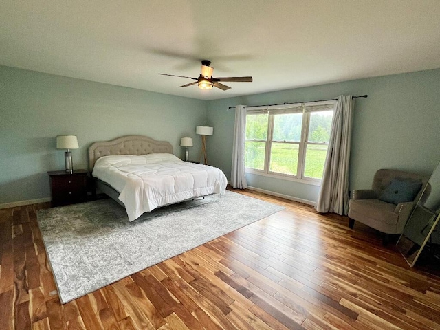 9220 Cotters Ridge Rd, Richland, MI 49083 - bedroom featuring wood finished floors, baseboards, and ceiling fan