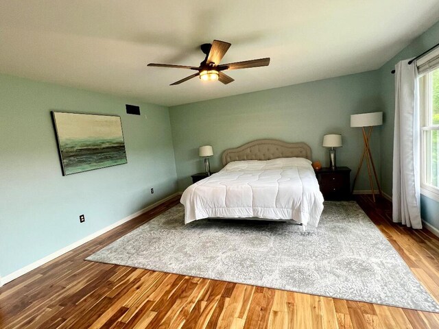 9220 Cotters Ridge Rd, Richland, MI 49083 - bedroom featuring wood finished floors, baseboards, and ceiling fan